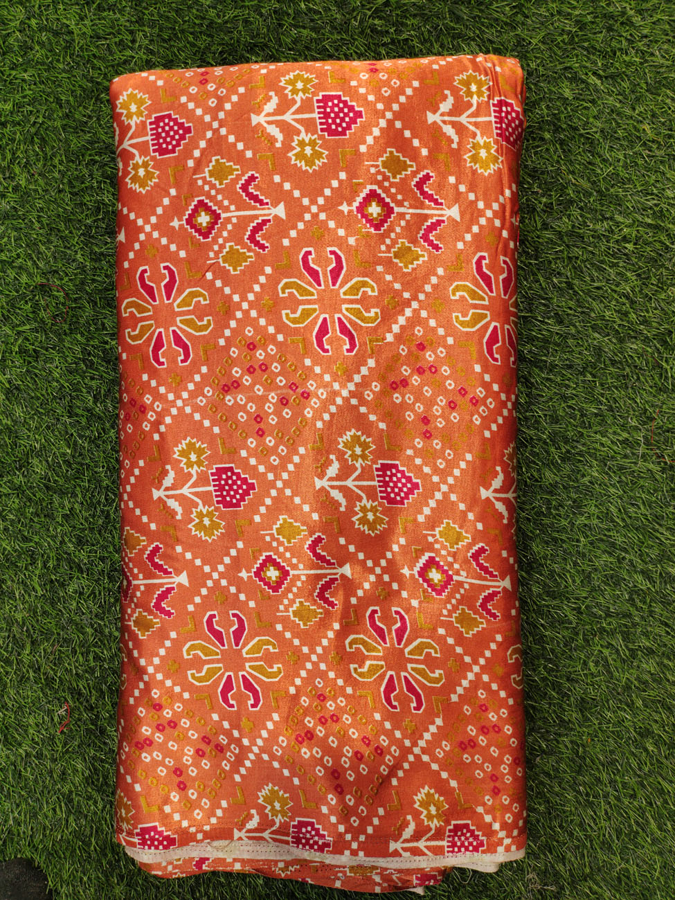 Gaji Silk Orange Fabric With Gaji Table Print